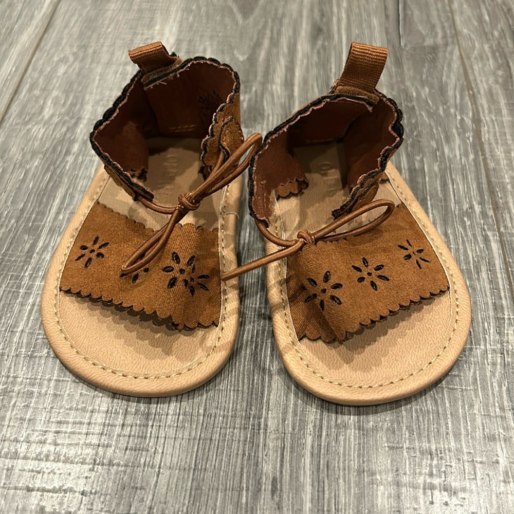 Baby girl moccasin sandals.